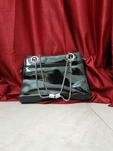 Black Handbag With Gold Detailing
