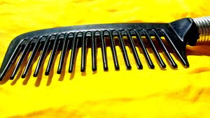 Two Combs With Silver Coating