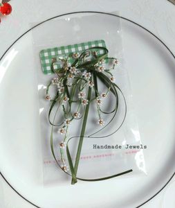 Beaded Daisy &amp; Satin Bow Hoop Earrings