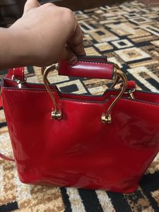 Red Handbag with Floral Detail
