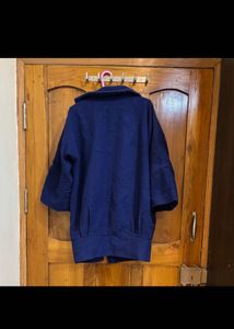 purle-blue woolen overcoat