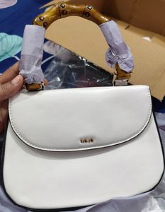 Iykyk White Bamboo Handle Sling Bag..