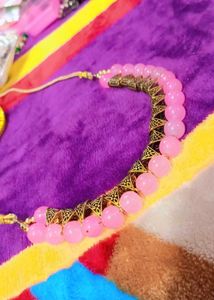 A Preety Baby Pink Neckpiece With Earrings