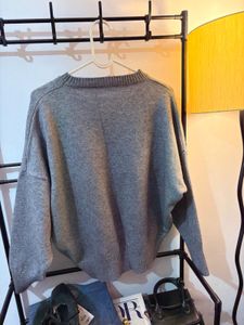 Gray Sweater with Fur Pocket