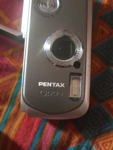 Pentax D-BC8 Camera With Penta Battery.