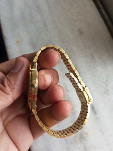 Titan Gold Tonned Oval Shaped Unisex  Watch