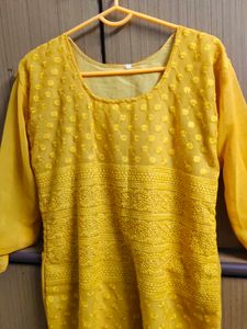 Limited Period Offer !!!Yellow Embroidered Kurti