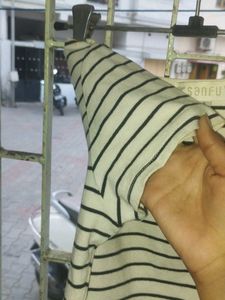 white top with black line