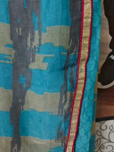 Pretty Blue Saree With Bright Red Border