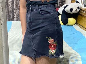 Black embroidered denim skirt