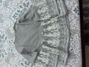 Grey Colored Embroidered Peplum Top