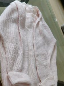 light pink sweater for cozy winters.