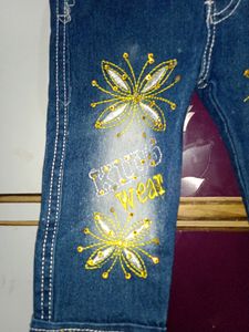 Denim Jeans With Yellow Top.