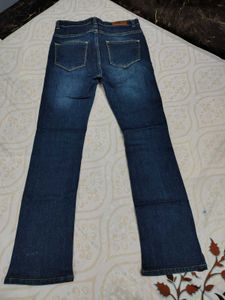 Distressed Denim Jeans