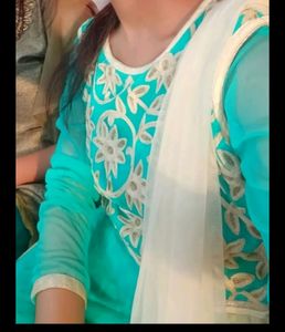 Beautiful sea green gown frock for women.