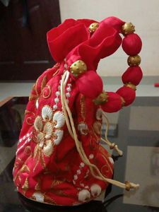lowest price red and golden potli bag