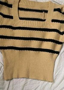 Its a Honeycomb Sweater With Yellow Black Straps