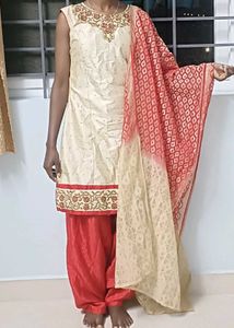 elegant red and creame kurta set