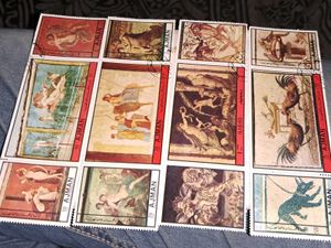 12 Vintage AJMAN painting stamps