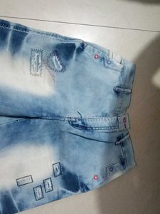 Distressed Patchwork Denim Jeans