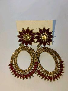 2 sets of ethnic earrings with golden detailing
