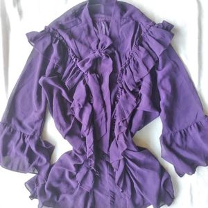 purple ruffle shirt
