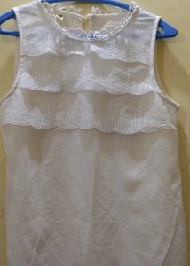White Sleeveless Top