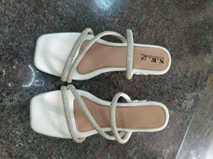 white , sparky heels