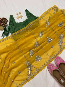 Elegant Yellow Embellished Saree