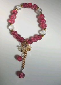pink Beaded Bracelet with acrylic floral hanging