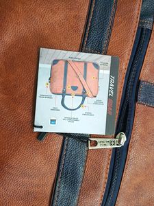 Brown and Navy Leather Travel Bag