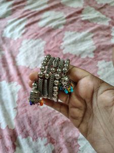 Silver tone bracelet and earrings