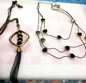 Long Neck Piece And Black Earrings