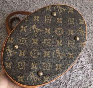 Authentic Louis Vuitton Monogram Petit Bucket Bag