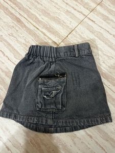 denim skir, white ribbed t shirt and  jac