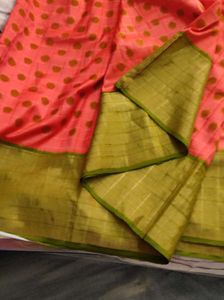 orange and green pocham.palli silk saree