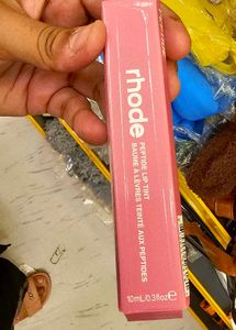 Rhode Peptide Lip Tint Along With Phone Case