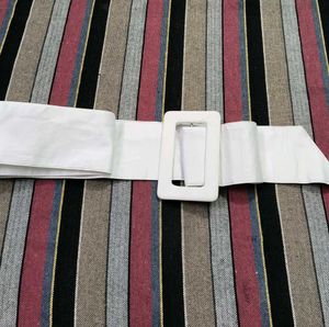 This is a very beautiful white colored cloth belt