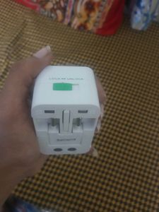 new unused travel friendly adaptor with pouch