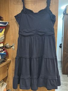 A pretty tiered navy blue dress