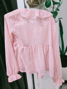 Pink Ruffle Sheer Top and Jeans