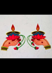 Hand With Diya Rangoli