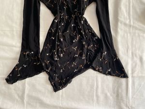 Set Of Asymmetrical Top And Skorts