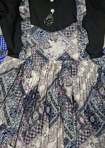 Patterned Dress with Unique Brooch