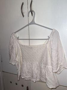 Cream Smocked Peplum Top