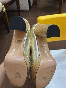 Gucci Gold Heels