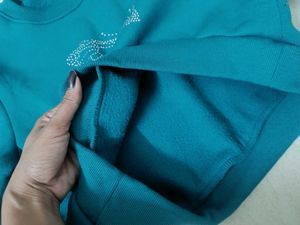 Teal Crop sweatshirt with Butterfly Detail