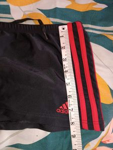 Adidas black three striped red mini shorts