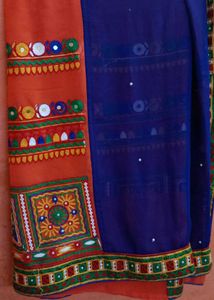 A Heavy Orange Blue Saree