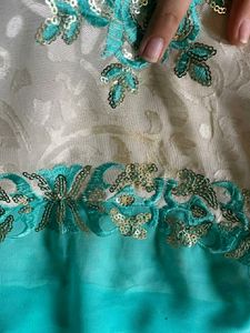 Half Green And White Saree With Stitched Blouse